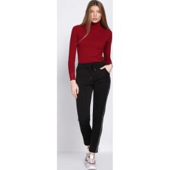 Czarne Spodnie Dresowe Patience. Czarne spodnie dresowe damskie marki Born2be, xl, z dresówki. Za 39,99 zł.