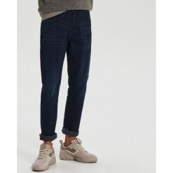 Jeansy regular - Niebieski. Niebieskie jeansy męskie Cropp, m, bez wzorów. Za 149,99 zł.