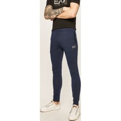 EA7 Emporio Armani - Spodnie. Niebieskie spodnie męskie EA7 Emporio Armani, xl, bez wzorów, z bawełny. W wyprzedaży za 299,90 zł.