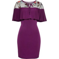 Sukienka z falbaną bonprix lila w kwiaty. Fioletowe sukienki damskie bonprix, w kwiaty, bez kołnierzyka, bez rękawów. Za 64,99 zł.