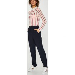 Tommy Hilfiger - Spodnie. Niebieskie spodnie damskie TOMMY HILFIGER, l, bez wzorów, z poliesteru. W wyprzedaży za 179,90 zł.