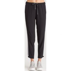 SPODNIE DRESOWE LIU JO SPORT. Czarne spodnie damskie Liu Jo Sport, s, z dresówki, sportowe. Za 353,40 zł.