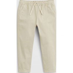 Mango Kids - Spodnie dziecięce Melisa 80-104 cm. Spodnie dziewczęce Mango Kids, bez wzorów, z elastanu. Za 69,90 zł.