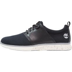 Timberland Sneakersy niskie blackout. Czarne sneakersy męskie Timberland, bez zapięcia. W wyprzedaży za 381,75 zł.