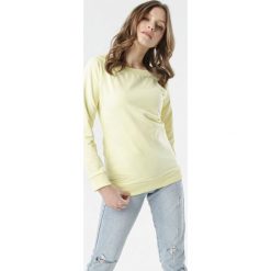 Żółta Bluza Bessie. Żółte bluzy damskie Born2be, xl, bez wzorów, z dzianiny, z długim rękawem, długie, bez kaptura. Za 69,99 zł.