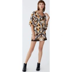 Minispódniczka w łańcuchy. Czarne spódniczki damskie Pull&Bear, bez wzorów. Za 59,90 zł.