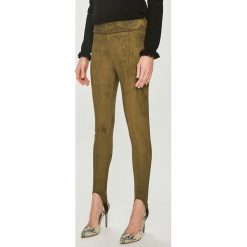 Desigual - Legginsy. Zielone spodnie damskie Desigual, s, z elastanu. W wyprzedaży za 129,90 zł.