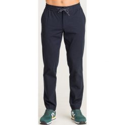 SPODNIE Armani Exchange. Niebieskie spodnie męskie Armani Exchange, na imprezę, m, z haftami, z materiału. Za 365,40 zł.