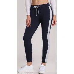 Granatowe Spodnie Echoxera. Niebieskie spodnie damskie Renee, xl, z dresówki. Za 69,99 zł.