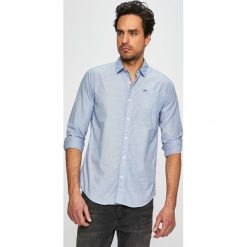 Tommy Jeans - Koszula. Białe koszule męskie Tommy Jeans, s, bez wzorów, z bawełny, klasyczne, z klasycznym kołnierzykiem, z długim rękawem. W wyprzedaży za 239,90 zł.