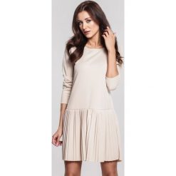 Jasnobeżowa Sukienka Towel. Brązowe sukienki damskie Renee, na co dzień, s, bez wzorów, eleganckie, z okrągłym kołnierzem, bez rękawów, długie, mini, proste. Za 79,99 zł.