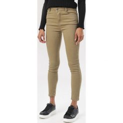Beżowe Spodnie Skinny Hireia. Brązowe rurki damskie Born2be, bez wzorów. Za 89,99 zł.