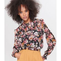 Bluzka w stylu retro - Czarny. Czarne bluzki damskie Mohito, bez wzorów, retro, bez kołnierzyka, bez rękawów. Za 79,99 zł.