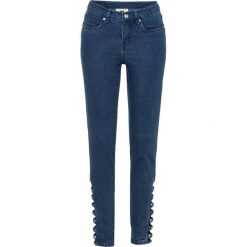 Dżinsy push-up z wycięciem bonprix ciemnoniebieski "used". Niebieskie jeansy damskie bonprix. Za 134,99 zł.