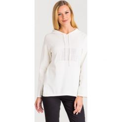 BLUZA Armani Exchange. Białe bluzy damskie xs, z aplikacjami. Za 371,40 zł.