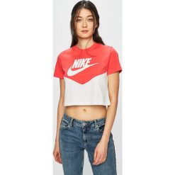 Nike Sportswear - Top. Białe topy damskie Nike Sportswear, s, z nadrukiem, z bawełny, z okrągłym kołnierzem. W wyprzedaży za 79,90 zł.