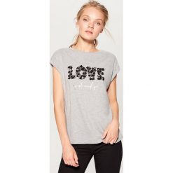 Koszulka z koronkową aplikacją - Szary. Szare t-shirty damskie Mohito, l, z aplikacjami, z koronki. W wyprzedaży za 39,99 zł.