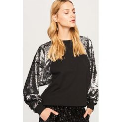 Bluza z cekinowymi rękawami - Czarny. Czarne bluzy damskie marki Reserved, l. Za 139,99 zł.