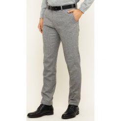 Spodnie materiałowe Tommy Hilfiger Tailored Wool Blend TT0TT06281. Niebieskie jeansy męskie Tommy Hilfiger Tailored, m, bez wzorów, z elastanu. W wyprzedaży za 289,00 zł.