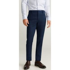Mango Man - Spodnie Paulo. Niebieskie spodnie męskie Mango Man, z haftami, z elastanu. Za 199,90 zł.
