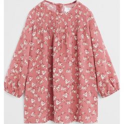 Mango Kids - Sukienka dziecięca Soft 80-104 cm. Różowe sukienki dziewczęce Mango Kids, bez wzorów, z wiskozy, casualowe, z długim rękawem, długie, maxi, rozkloszowane. Za 89,90 zł.