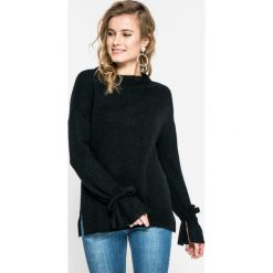 Vero Moda - Sweter. Czarne swetry klasyczne damskie marki Vero Moda, l, z dzianiny, z okrągłym kołnierzem. W wyprzedaży za 69,90 zł.