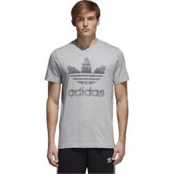 KOSZULKA ADIDAS TRACTION TREFOIL TEE (XL). Koszulki męskie Adidas, xl, z nadrukiem, z bawełny, z klasycznym kołnierzykiem, bez rękawów. W wyprzedaży za 119,99 zł.