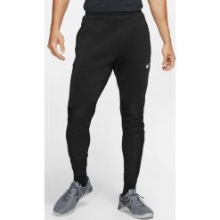 Nike Nike Pro Spodnie dresowe Czarny. Czarne spodnie męskie Nike, l, bez wzorów, z elastanu. Za 292,95 zł.