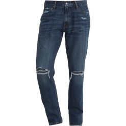 Abercrombie & Fitch DISTRESSED Jeansy Slim Fit medium destroy. Niebieskie jeansy męskie relaxed fit marki Abercrombie & Fitch. Za 369,00 zł.