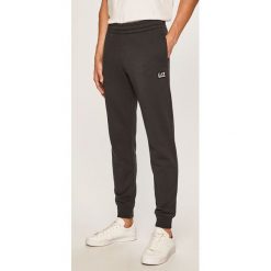 EA7 Emporio Armani - Spodnie. Szare spodnie męskie EA7 Emporio Armani, na co dzień, xxl, bez wzorów, z bawełny, casualowe. Za 399,90 zł.