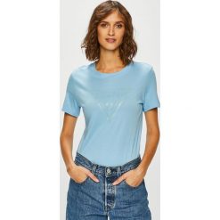 Guess Jeans - Top. Niebieskie bluzki damskie Guess Jeans, s, z nadrukiem, z bawełny, z okrągłym kołnierzem. W wyprzedaży za 119,90 zł.
