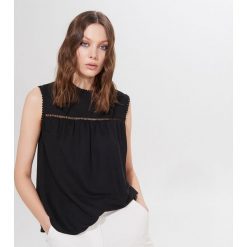 Trapezowy top z wiskozą - Czarny. Czarne topy damskie Mohito, s, bez wzorów, z wiskozy, bez kołnierzyka. Za 59,99 zł.