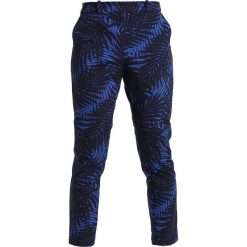 Polo Ralph Lauren Golf PRINTED POLY Spodnie materiałowe blue. Niebieskie spodnie damskie marki Polo Ralph Lauren Golf, z elastanu. W wyprzedaży za 419,50 zł.