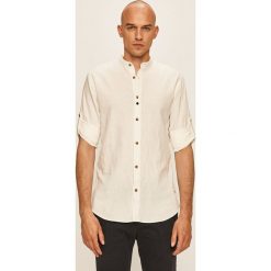 Jack & Jones - Koszula. Niebieskie koszule męskie Jack & Jones, s, bez wzorów, z bawełny, casualowe, ze stójką, z długim rękawem. W wyprzedaży za 89,90 zł.