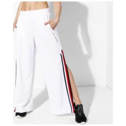 Tommy Sport Spodnie With Snaps 141 , biały, rozmiar XS. Białe spodnie damskie TOMMY HILFIGER, s, z dresówki. W wyprzedaży za 299,99 zł.