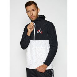 Wiatrówka NIKE Jordan Clssics Windwear CT9368. Czarne kurtki sportowe męskie Nike, m, bez wzorów, z poliamidu, bez kaptura, do biegania. Za 399,00 zł.