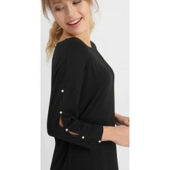 T-shirty damskie: Koszulka z perełkami