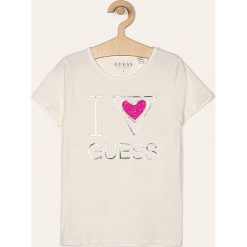 Guess Jeans - T-shirt dziecięcy 118-175 cm. Białe bluzki dziewczęce Guess Jeans, z aplikacjami, z elastanu, z okrągłym kołnierzem, z krótkim rękawem, krótkie, bez kaptura. Za 99,90 zł.