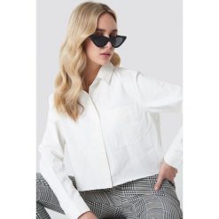 Koszule jeansowe damskie: NA-KD Trend Koszula jeansowa z surowym brzegiem - White