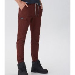 Spodnie jogger z kieszenią - Bordowy. Czerwone spodnie męskie House, s, bez wzorów. Za 129,99 zł.