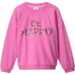 Sweter z polaru z cekinami bonprix lila - różowy. Różowe swetry dziewczęce bonprix, bez wzorów, z polaru, bez kołnierzyka, bez rękawów, bez kaptura. Za 34,99 zł.
