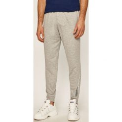 Nike - Spodnie. Czarne spodnie męskie Nike, na co dzień, m, z nadrukiem, z poliesteru. Za 189,90 zł.