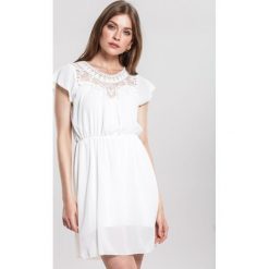 Biała Sukienka Mart. Białe sukienki damskie Renee, na imprezę, s, z haftami, eleganckie, bez kołnierzyka, bez rękawów, mini. Za 79,99 zł.