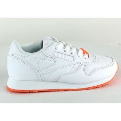 Sneakersy w kolorze biało-pomarańczowym. Pomarańczowe trampki dziewczęce Rock & Joy, bez wzorów, na sznurówki. W wyprzedaży za 85,95 zł.