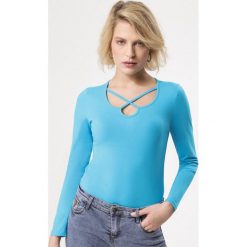 Niebieska Bluzka Flare Up. Niebieskie bluzki damskie Born2be, xl, w paski, z dzianiny, bez kołnierzyka, z długim rękawem. Za 29,99 zł.