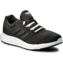 Buty adidas - Galaxy 4 W CP8833 Carbon/Carbon/Ftwwht. Czarne buty do biegania damskie marki Adidas, z kauczuku. W wyprzedaży za 169,00 zł.