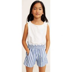 Mango Kids - Szorty dziecięce Teo 110-164 cm. Spodenki dziewczęce Mango Kids, bez wzorów, z elastanu, casualowe. W wyprzedaży za 39,90 zł.