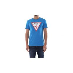 T-shirty z krótkim rękawem Guess M92I17 K6XNO. Niebieskie t-shirty męskie Guess, s, z aplikacjami, bez kołnierzyka, krótkie. Za 118,13 zł.