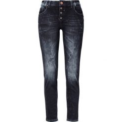 PULZ Dżinsy do kostki Rosita ciemnoniebieski denim female niebieski W32. Niebieskie jeansy damskie PULZ, z standardowym stanem. W wyprzedaży za 235,00 zł.