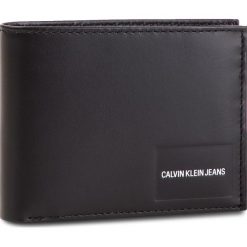 Duży Portfel Męski CALVIN KLEIN JEANS - Coated Canvas Bilfold Coin Pass K40K400831 001. Czarne portfele męskie marki Calvin Klein Jeans, bez wzorów, z jeansu. Za 299,00 zł.